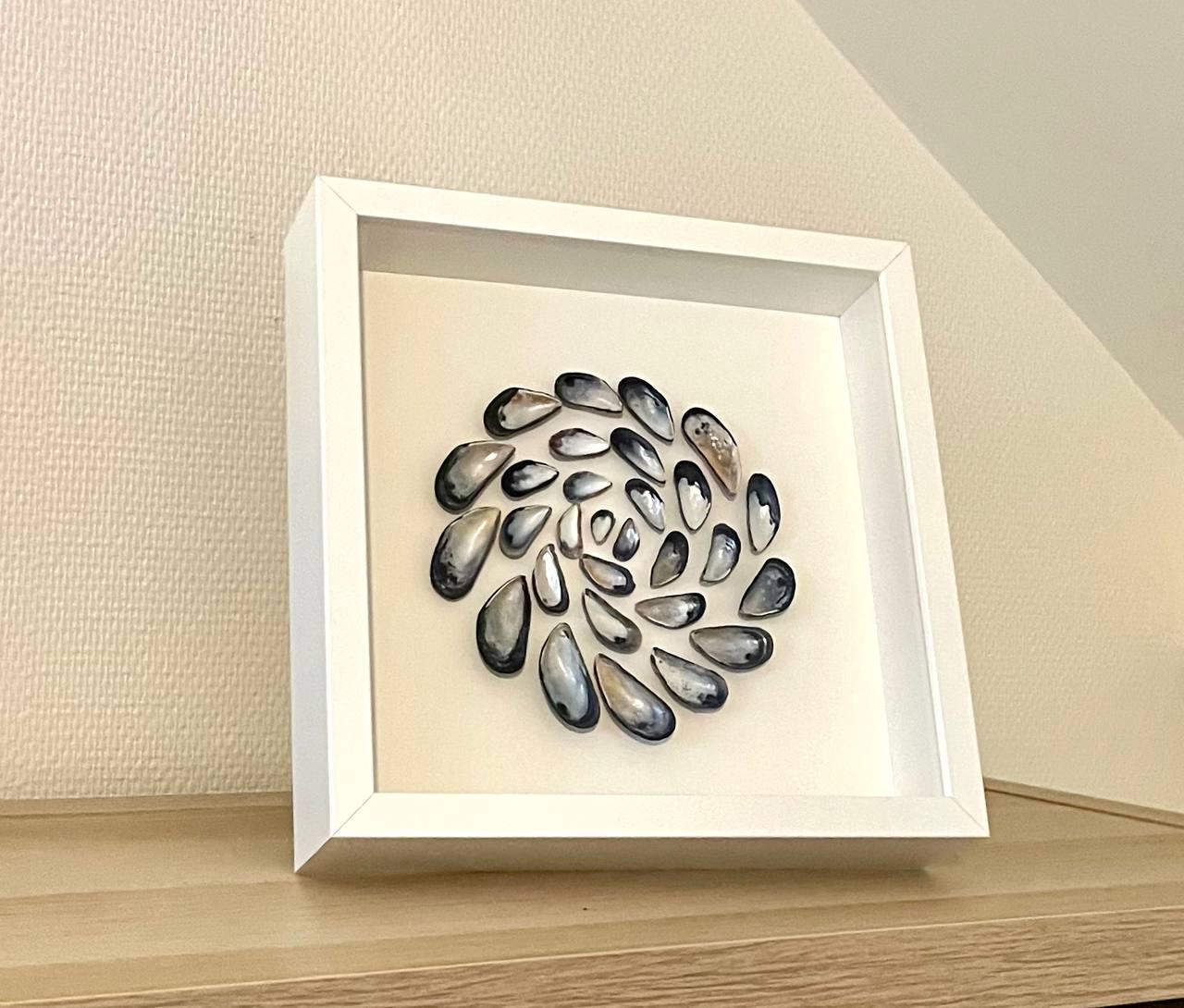 Spiral Art for Cozy Bedroom Interior Decor with North Sea Shells